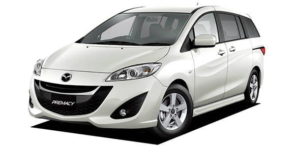 White Mazda minivan front three-quarter view