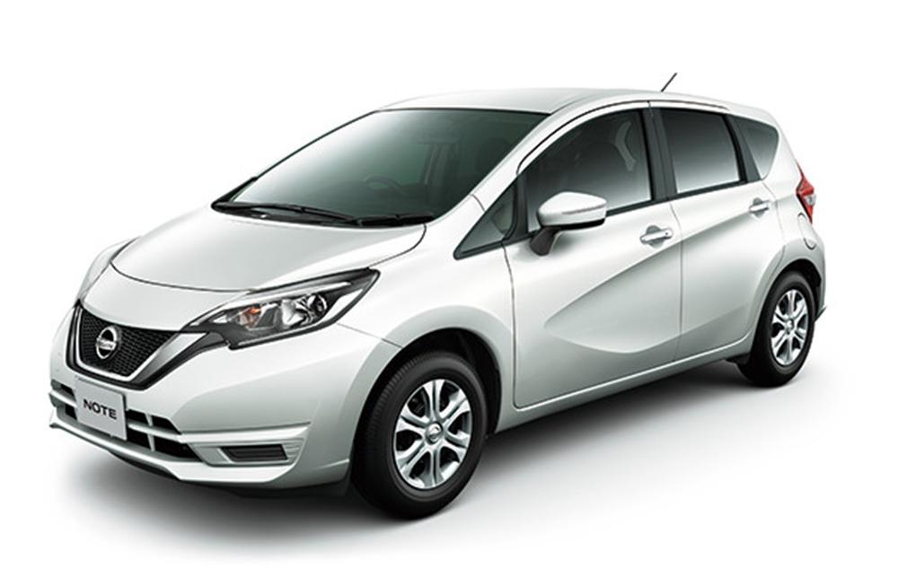 White Nissan Note hatchback car front view
